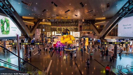 95946349-14443341-The_passenger_terminal_is_the_biggest_building_in_Qatar_and_a_jo-a-4_1741507148751