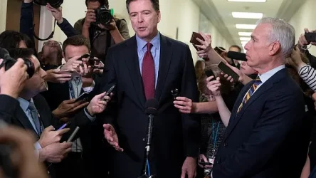 98445359-14719431-Comey_quickly