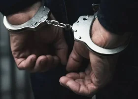 crime cuff hand